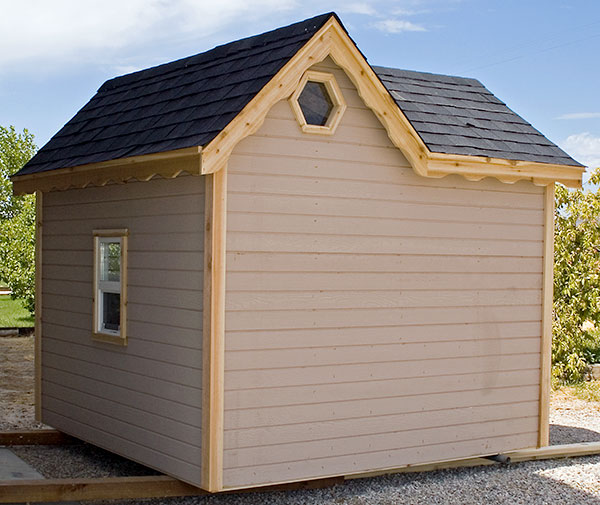 Image of back side of outdoor playhouse