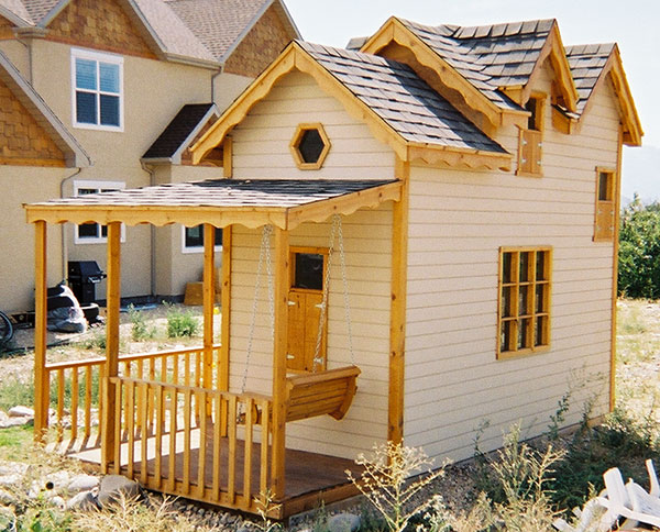 wrap around porch with swing for playhouse